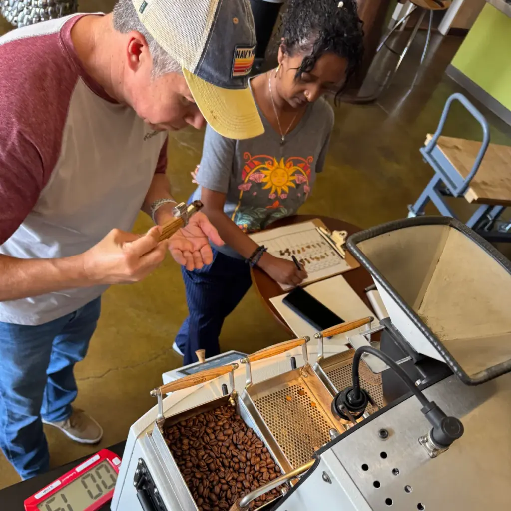 ai safe job coffee roasting man and woman roasting coffee